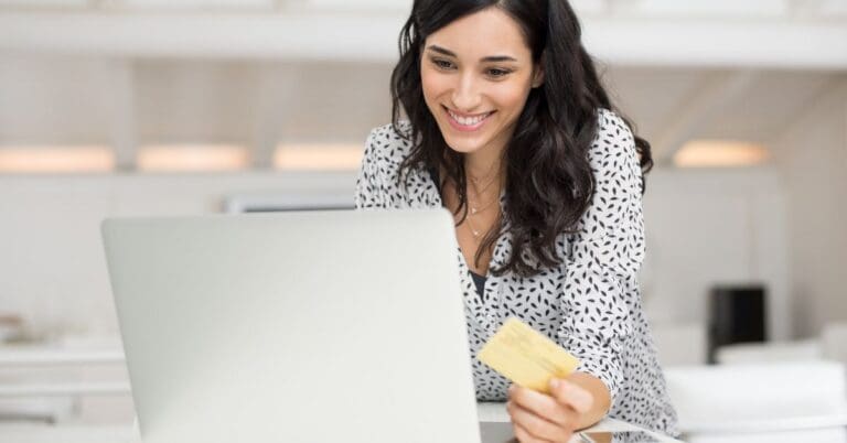 woman shopping online with credit card
